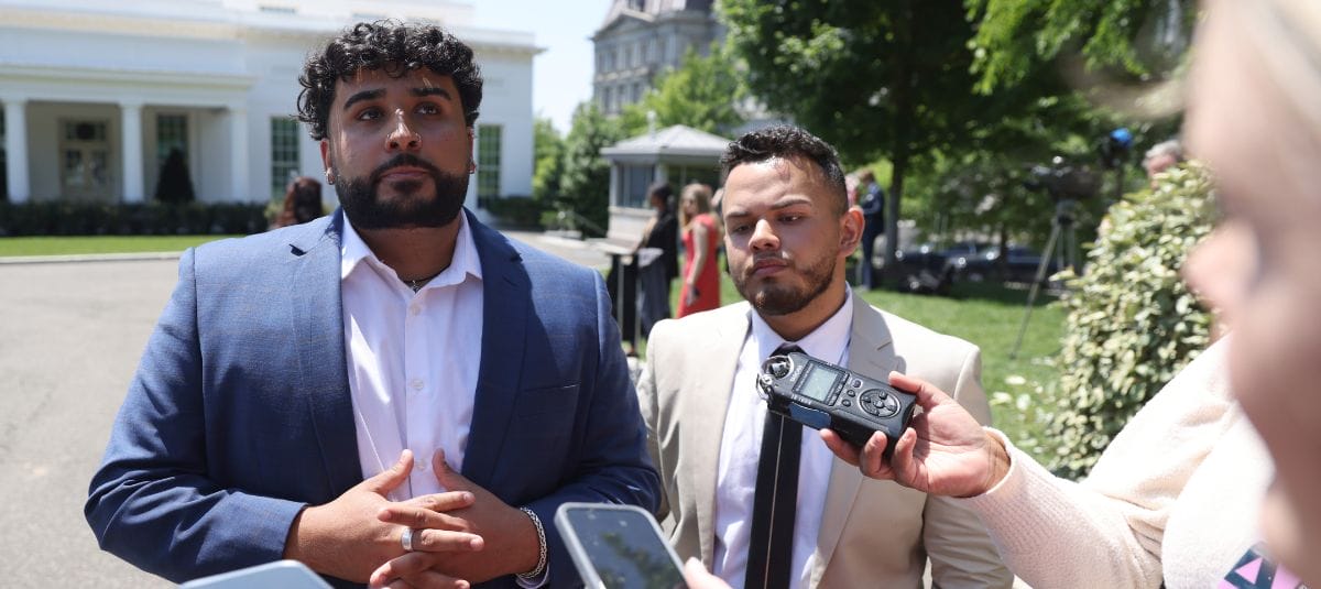 Jorge Alvarez speaking to reporters outside the White House.