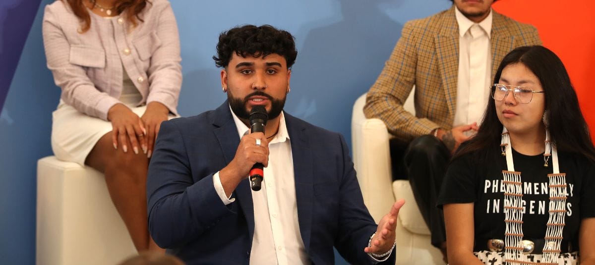 Jorge Alvarez speaking at the Mental Health Youth Action Forum.