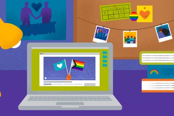 Illustrated graphic of a desk with various LGBTQ+ items of representation, including an open computer with pride flags onscreen, photos of individuals holding hands, and items with the Pride flag rainbow.