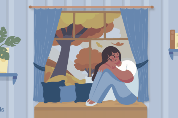 Illustrated image of a girl sitting on a window seat in her bedroom looking sad; leaves are falling from the tree outside her window.