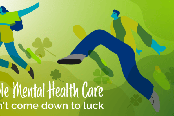 Image of two figures with four-leaf clovers and text that says 