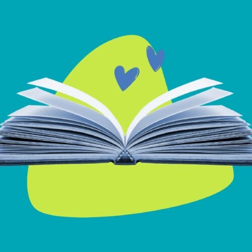 Open book on colorful background with illustrated hearts